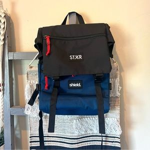 New without tags- STXR Shield backpack black blue.